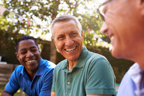 Men socializing on a nice day.