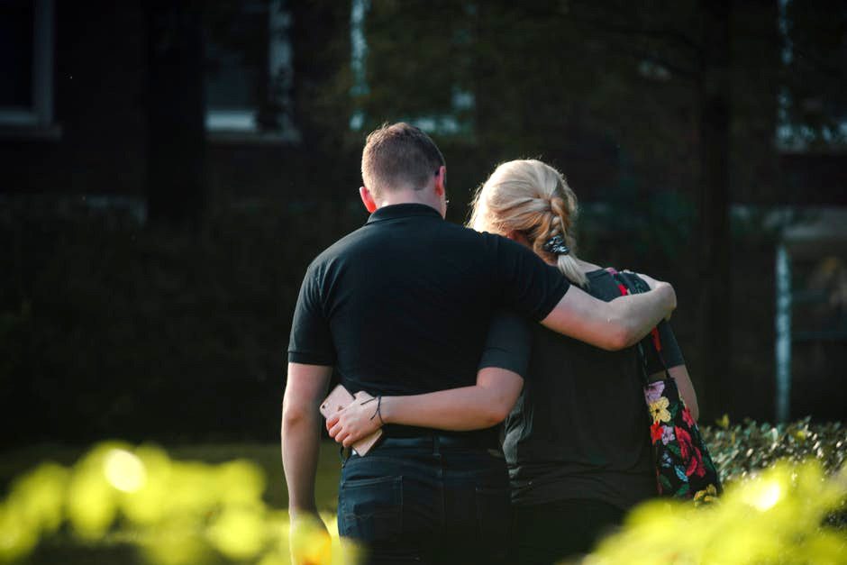 back view of a couple sharing a hug