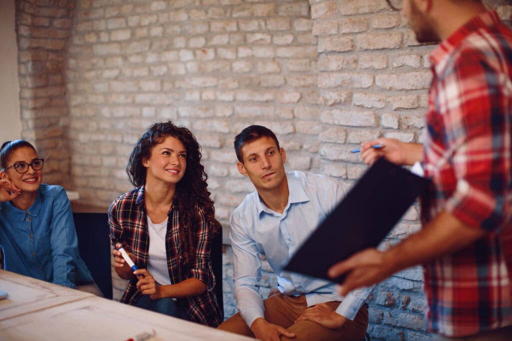 Coworkers collaborating in an office meeting