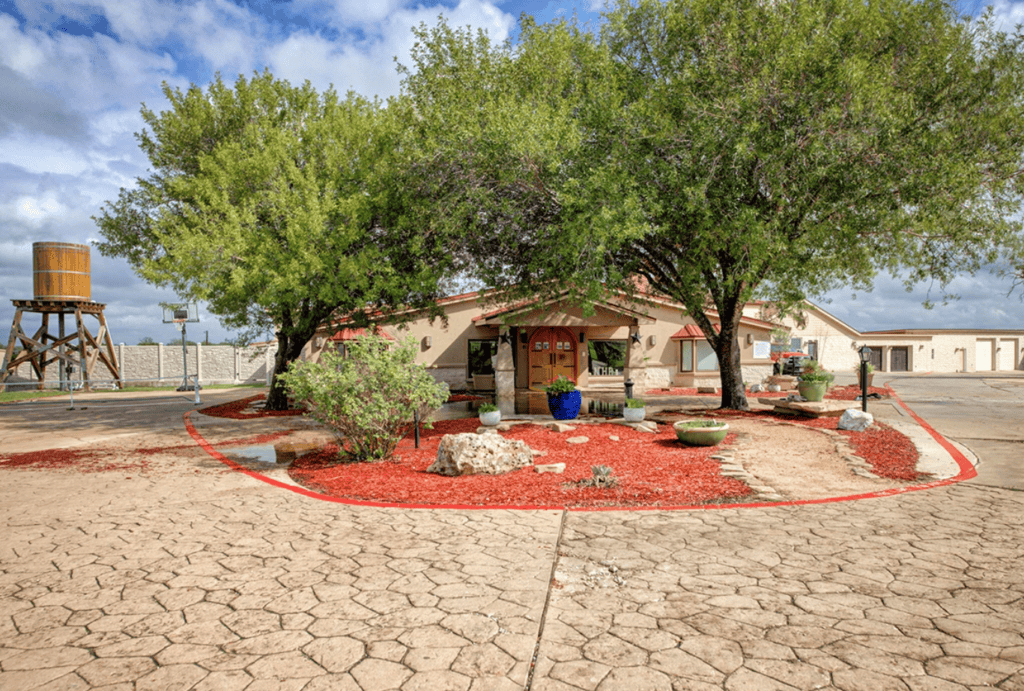 Main lodge and water tower at New Hope Ranch